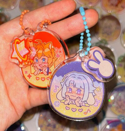 Keychains of fan art of Subaru and Hajime from Ensemble Stars, inspired by Tamagotchis (2023)